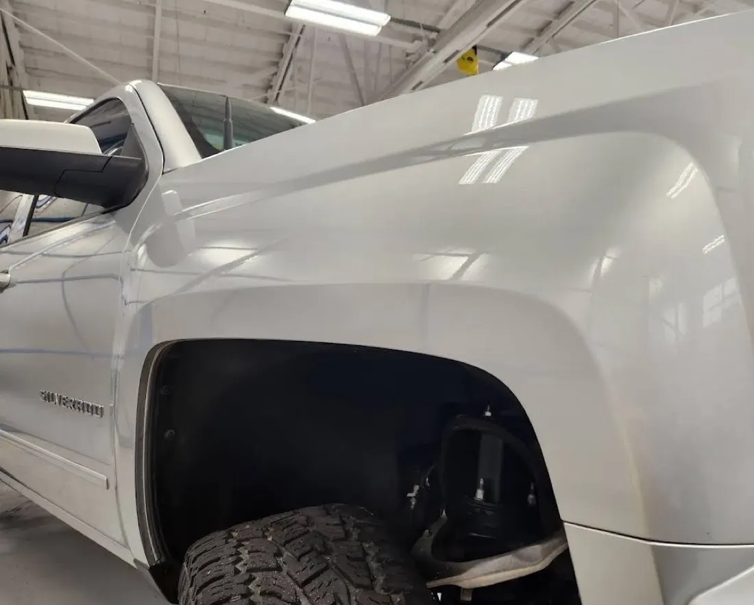 Sharp crease dent removed with advanced paintless dent repair in Mesa, AZ, after