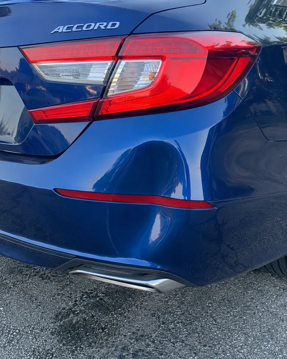 Bumper dent, Honda Accord, before repair