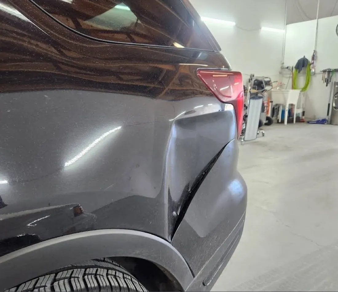 SUV rear quarter panel, after paintless dent repair