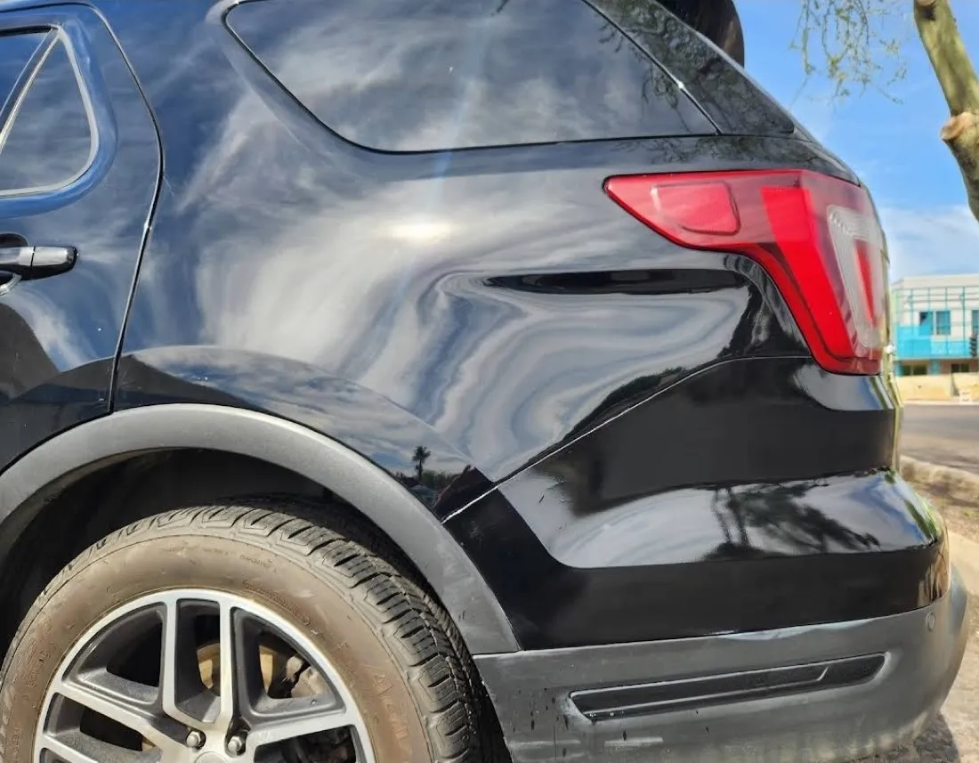SUV rear quarter panel, before repair